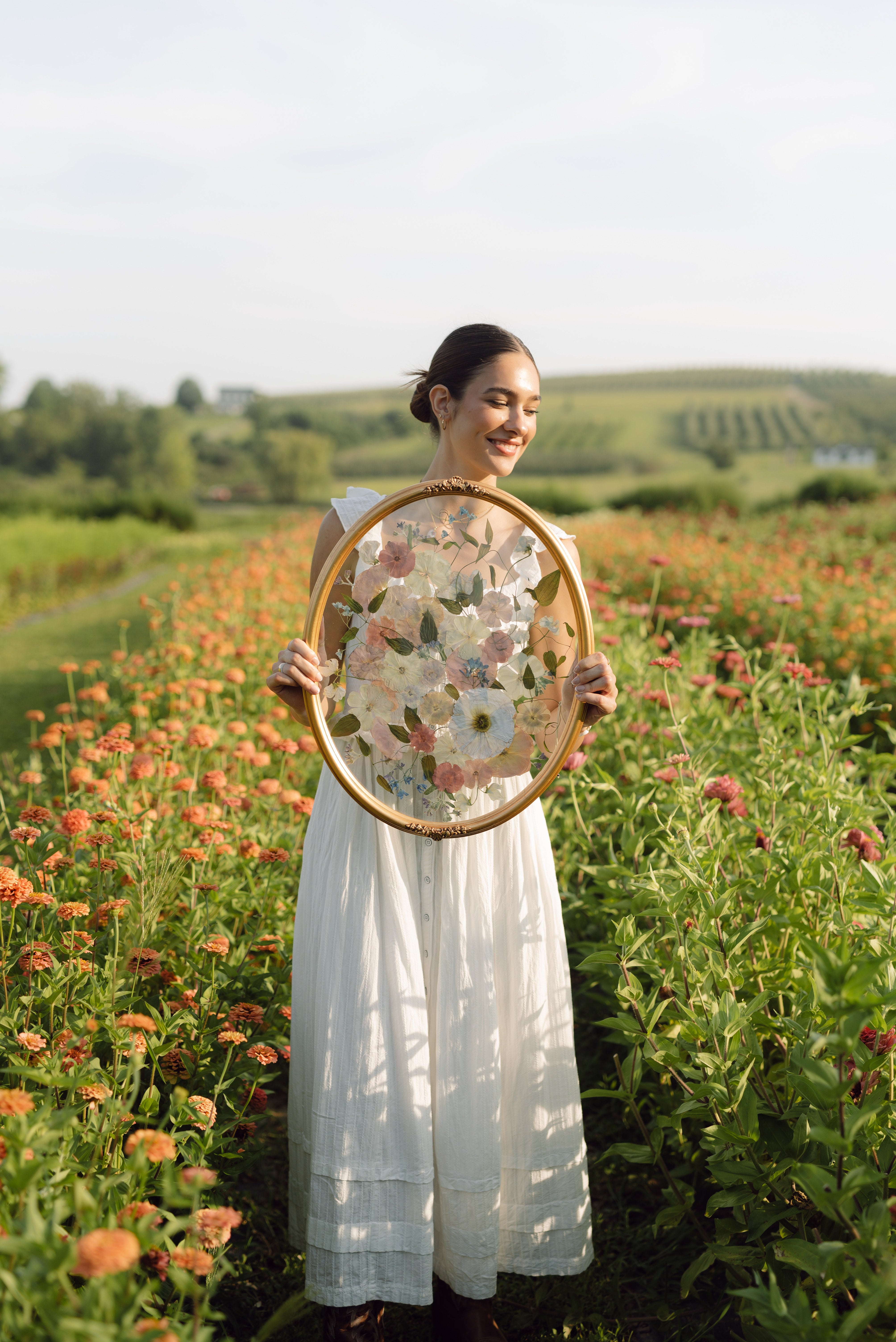 Pressed wedding bouquet preserved in custom floral frame by Hudson Stems